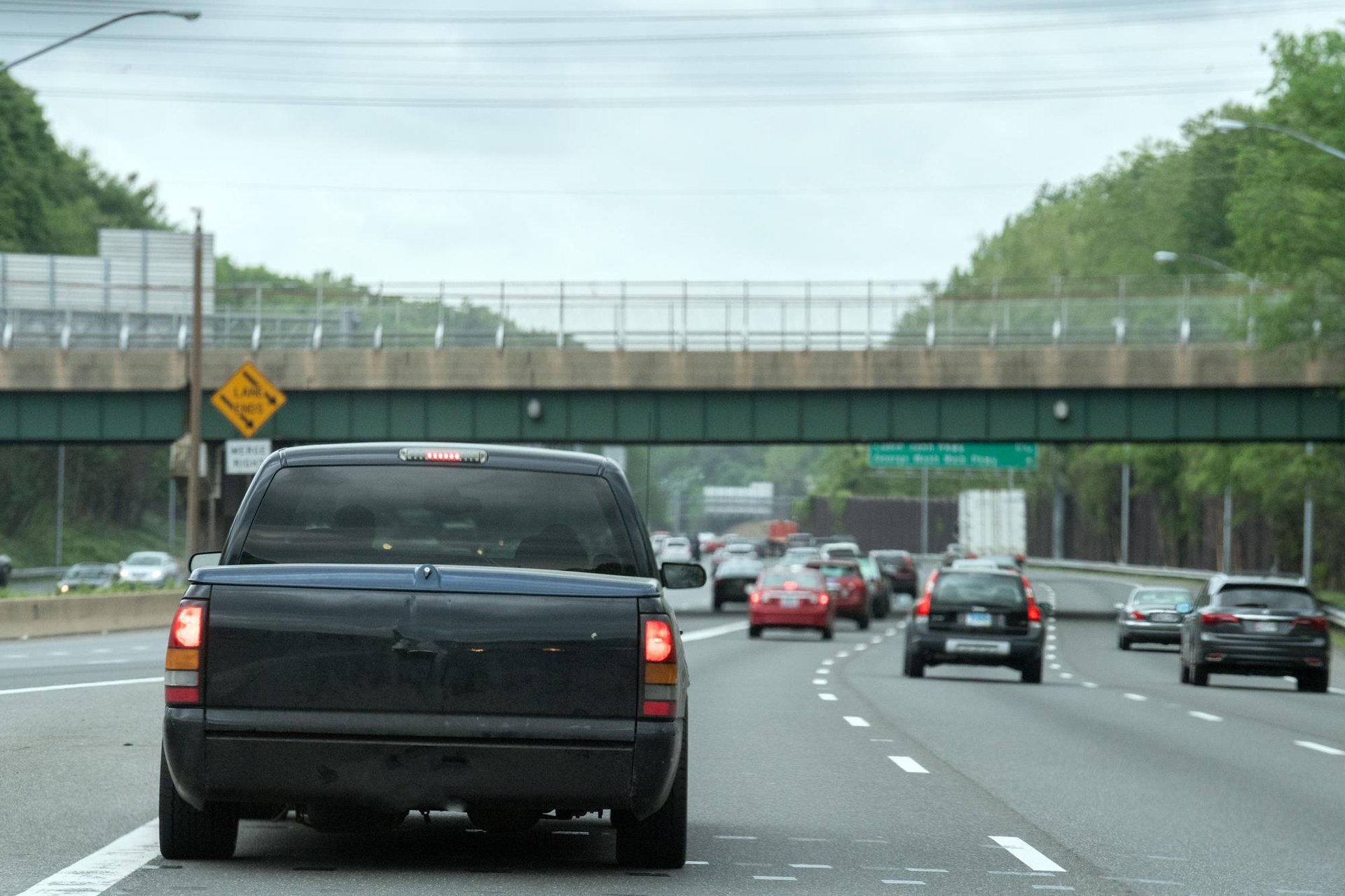 Aggressive driver tailgating another vehicle on a Roseville, California roadway.