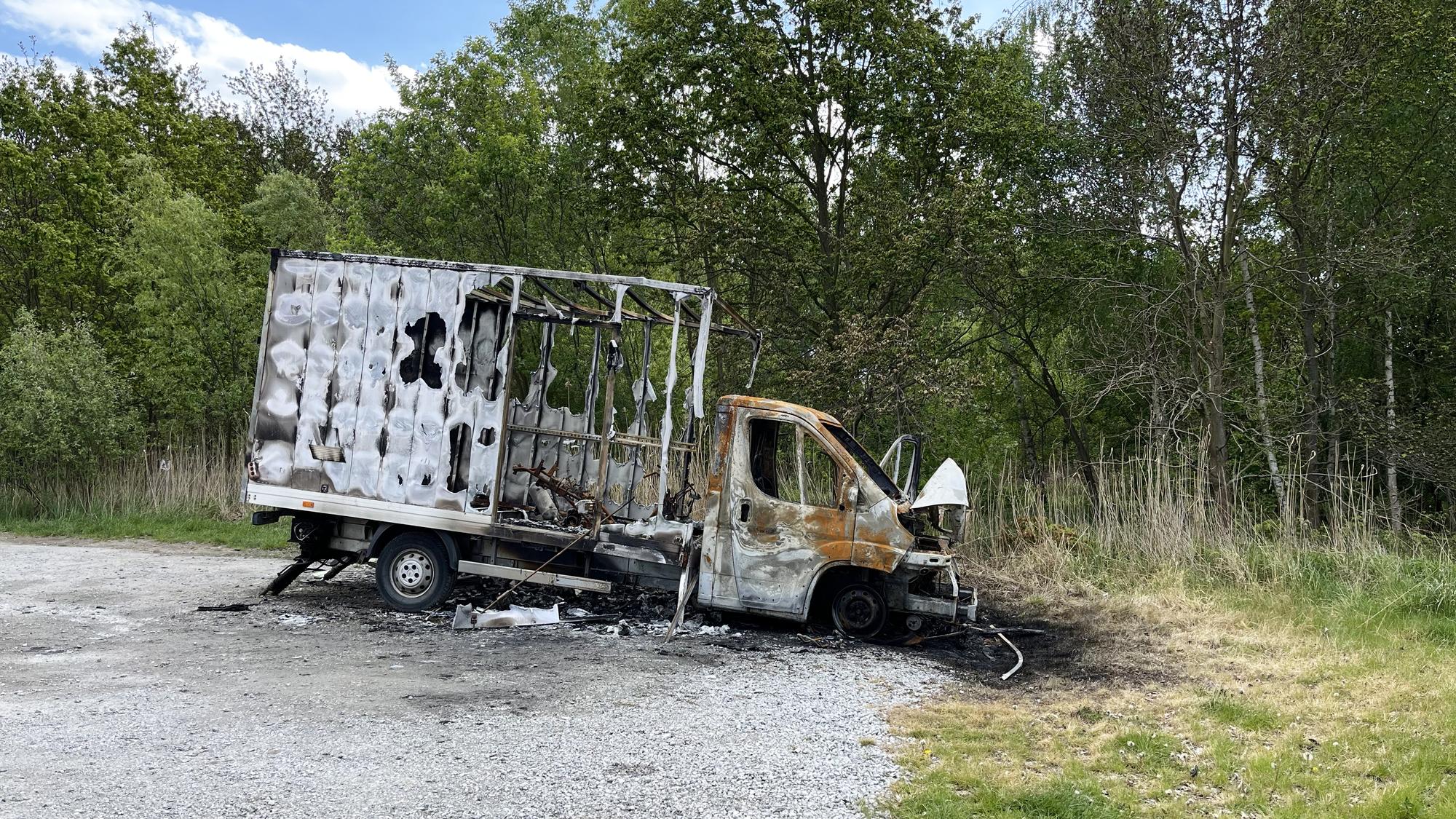 Semi truck on a highway at dusk — Roseville truck accident lawyers
